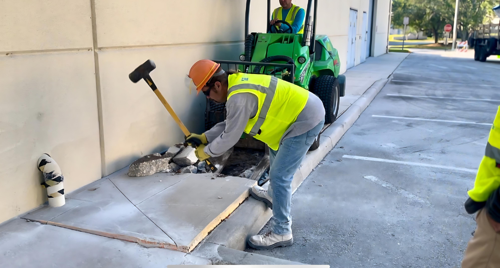 Licensed Element Service Solutions crew removing a sidewalk trip hazard
