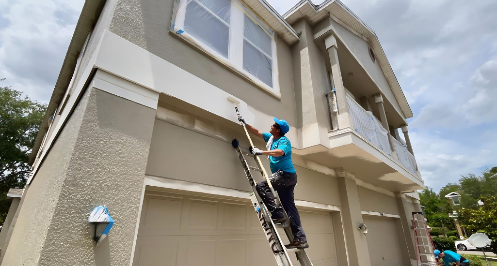 Element Service Solutions crew repainting a community building exterior